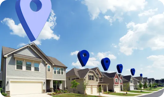 A row of houses with Smarty pins above each.