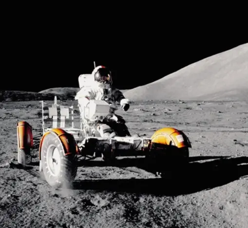 Astronaut driving on the surface of the moon